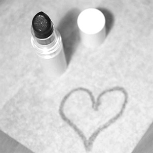 image of lipstick and heart drawn in lipstick
