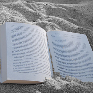 book in the sand