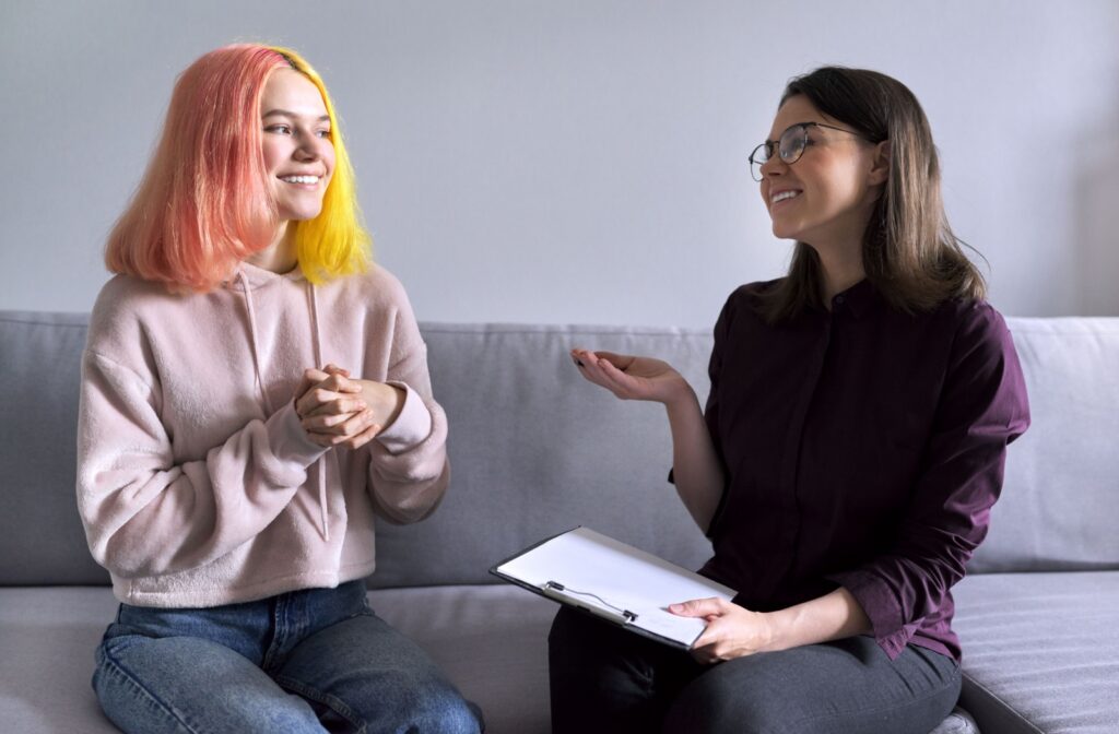 A youth having their mental health assessed mental by a primary care doctor, psychiatrist, psychologist, or social worker