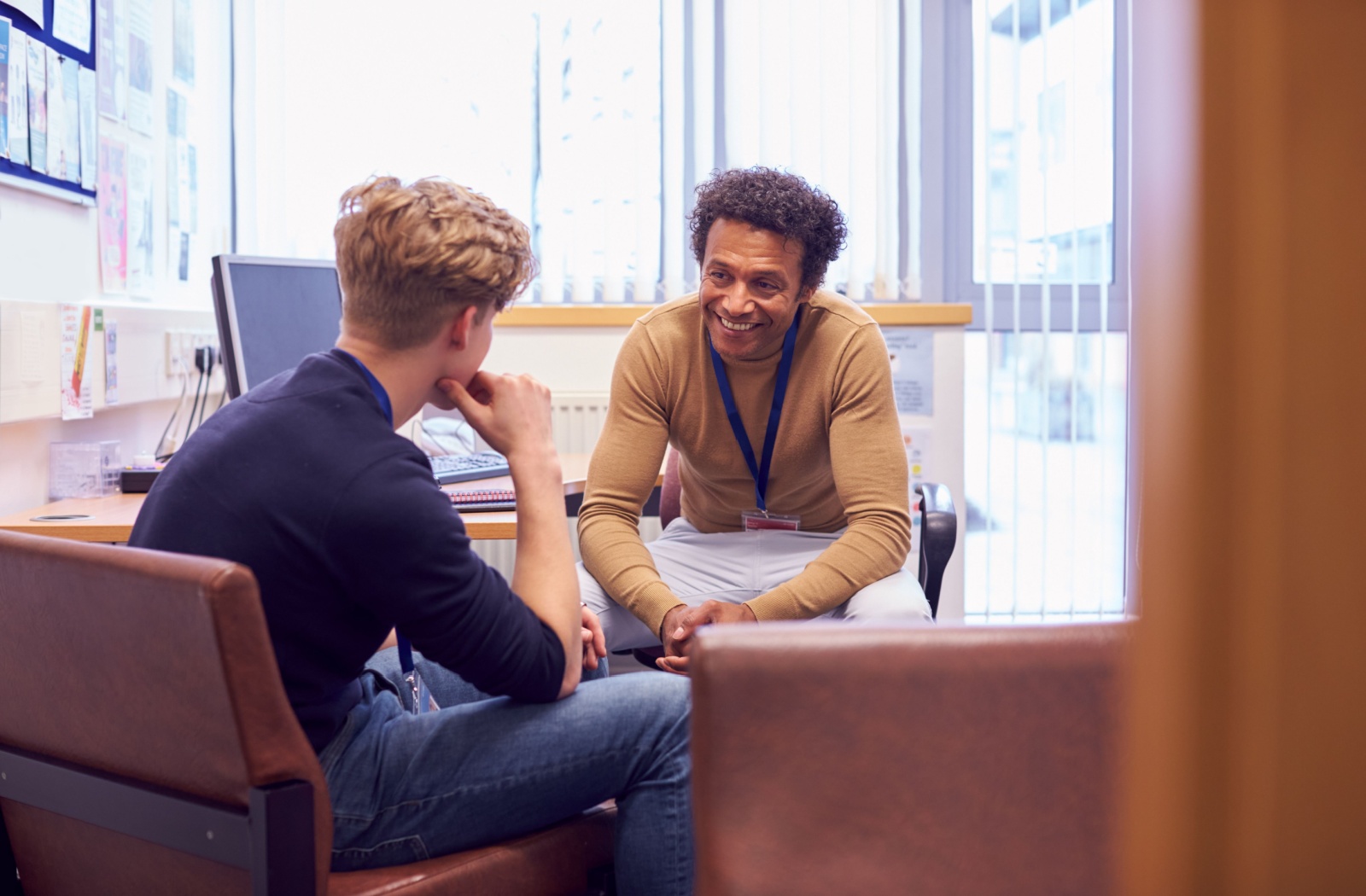 A youth talking to their family doctor, psychiatrist, psychologist, or social worker to help get a mental health diagnosis